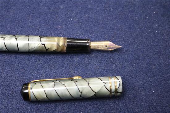 A collection of boxed fountain pens, etc.